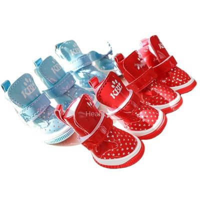 China Warm Autumn and Winter Stocked Teddy Cute Dog Boots Pet Dog Cat Shoes Warm Stamping Five Pointed Star Bright Shoes for sale