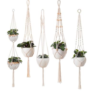 China Traditional Macrame Plant Hanger Handcraft 100% Bohemia Home Decor Wedding Indoor Outdoor Hotel Handmade Cotton Woven Rope Plant Hanger for sale