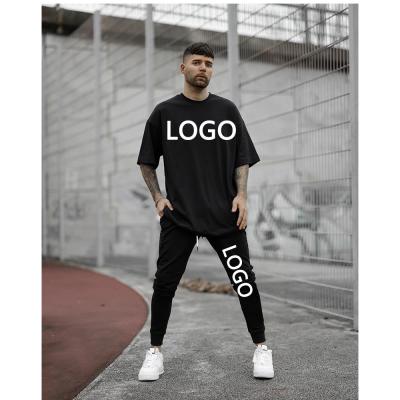 China Breathable Equipment Mens Sportswear Custom T-Shirt Pants Gym Tracksuit Joggers Pants Two Piece Set for sale