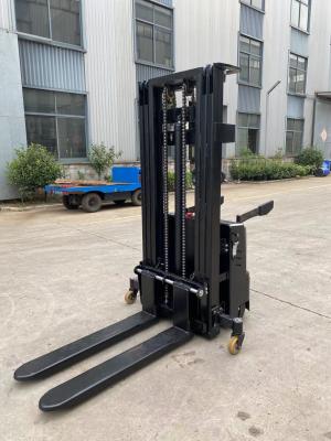 China Support customized Stand-on 1.6ton 4meters All-Electric stacker forklift with side wheels and safe arms for sale