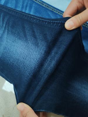 Chine 9 OZ High Stretch Jean tissu denim tissu pour femmes mince mince ajustement de femme faire en Chine Guangdong Foshan ville à vendre