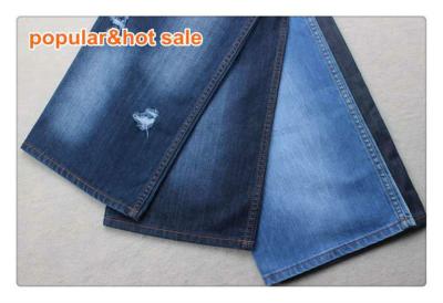 Chine Tissu raide Jean Material de denim de coton de la main 100 de bleu d'indigo de jeans d'habillement 12 onces à vendre