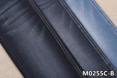 China Special Weaving 9 Oz Stretchy 70 Cotton 27 Polyester Raw Denim Fabric For Women for sale