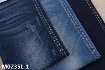 China 339gsm Women Jeans 65 Cotton 33 Polyester 2 Spandex Stain Denim Fabric Rolls for sale