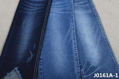 China Das Stretchable Sanforisieren spinnen 10 Unze-Denim-Gewebe für Frühlings-Winter-dünne Frauen-Jeans vor zu verkaufen