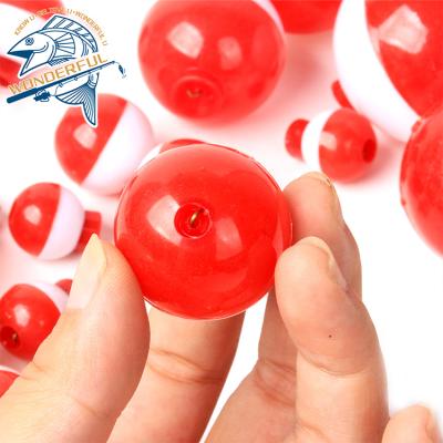 China Environmental Protection Wholesale ABS Stream Rock Red White Plastic Fishing Tackle Floating Round Fishing Float for sale