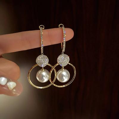 China 2021 New Fashion Luxurious Korean Oversized White Pearl Drop Earrings For Women Round Zircon Wedding Earrings Jewelry Bohemian Gold Gift for sale