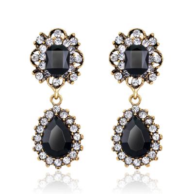 China 2021 high quality women clip rhinestone earrings statement luxury funky earrings high quality big women with rhinestones for sale