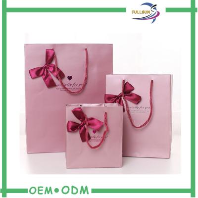 China Paper Shopping Bags with Handle and Bow ,  Elegant Paper Bags with Your Own Logo for sale