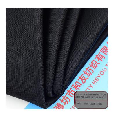 China Solid color durable cheap air-layer design stretch garment fabric spandex knitting breathable nylon fabric for sale