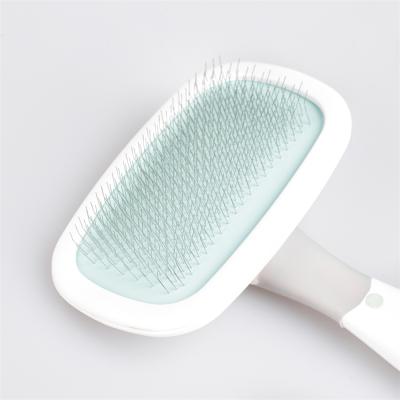 China Sustainable Dog Products Grooming Brush 360 Degree Rotating Long Haired Cat Pet Brush for sale