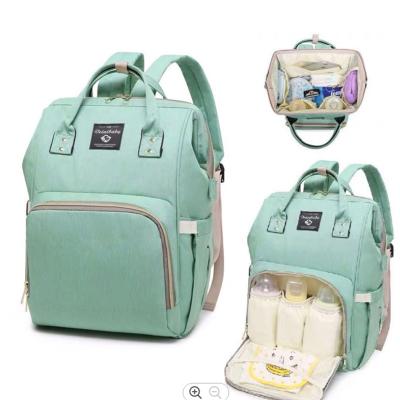 China Updated Water Proof Diaper Strap Backpack with Stroller Bag and USB Connect for Pregnant Women to Replace Travel Baby Care Pack for sale