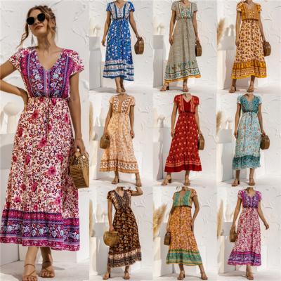 China Viable viable boho dresses 2021 summer style button lace flower arrangement hot short sleeve dress long spiky dress for sale