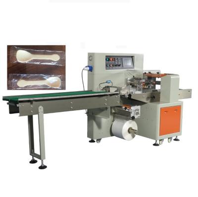 China Xzl-250x Food Chopsticks Packing Machine Pillow Packing Machine Tableware Packing Machine for sale