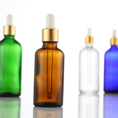 China Personal care factory sell 2oz dropper bottle clear dropper bottle essential oil green blue bottle for sale