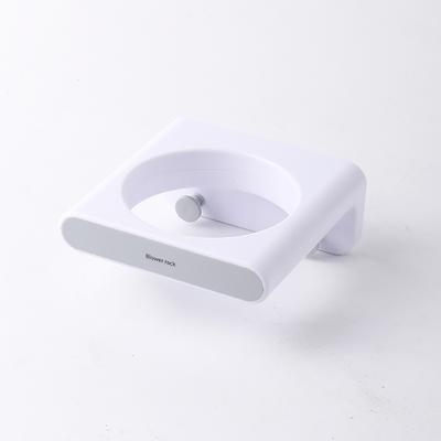 China Multifunctional Wall Mounted Fashionable Fashionable Simple Bathroom Hair Dryer Rack Air Duct Holder Hair Dryer Stand Viable for sale