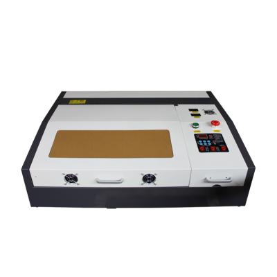 China laser machine engraving crystal 3d laser engraving machine price/co2 laser cutting machine/desktop 4060 laser for sale