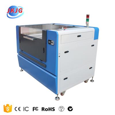 China Laser CUTTING high precision laser cutting machine 6090 cnc laser cutting machine top quality for solar cell for sale