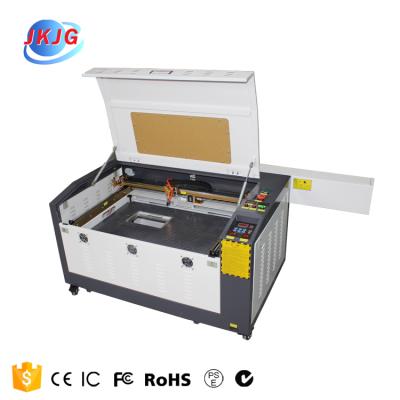 China Laser CUT 4060 laser engraving machine for aluminum granite stone laser engraving machine for sale