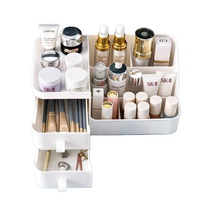 China Small Grid Makeup Organizer With Drawers Bathroom Countertop Makeup Organizer Small Plastic Skin Care Storage Box for sale