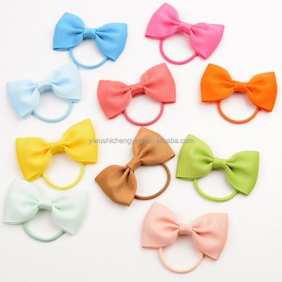 China Soft elastic hair band beautiful bow hair circle elastic band baby hair accessories European and American children's solid color for sale