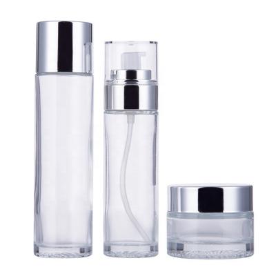 China Wholesale Empty Cosmetic Packaging Container Lotion Spray Clear Face Care Glass Bottles Jar Set With Pump for sale