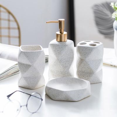 China Sustainable Modern Nordic Style 4 Piece Bathroom Accessory Set Multicolor Irregular Ceramic Bathroom Set for sale