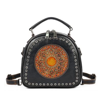 China Handmade Vintage Organizer Vintage Embossing Mandala Design Leather Totem Crossbody Satchel Bag for sale