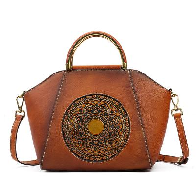 China Vintage Genuine Leather Handbags For Women Organizer Top Handle Satchel Vintage Totem Embossing Shoulder Bag for sale