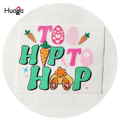 China Strong Elasticity Huaga Custom Designs Iron On Sticker Transfer Printing Fabric Plastisol Heat Transfers For T-shirt Apparel Press Logo for sale