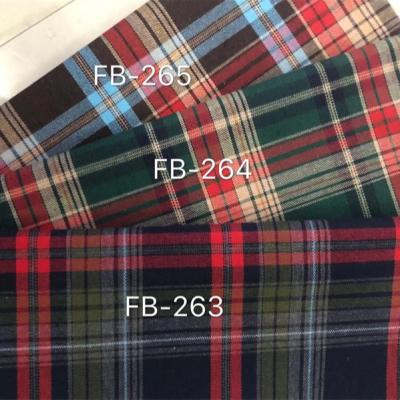 China Stain Factory Polyester Breathable Cotton Yarn Dyed Plaid New Christmas Cloth Handwork Fabric Frosted Plaid for sale