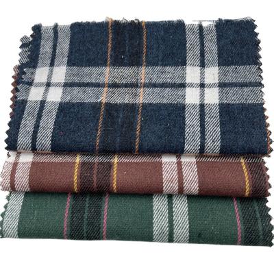 China Stain Factory Polyester Breathable Cotton Woven Yarn Dyed Net Red Plaid Floor Wool Shirt Fabric Pant for sale