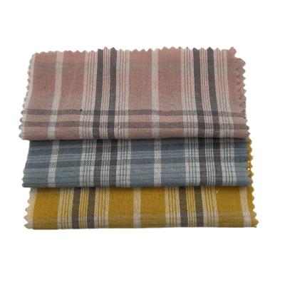 China Chinese factory wholesale QUICK DRY cotton yarn dyed geometric casual women's school uniform plaid fabric for sale