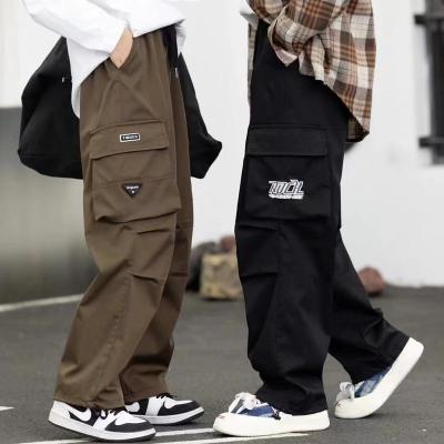 China Anti-wrinkle Autumn Youth Men's and Women's Workwear Pocket Pants Fashion Jogging Pants for sale