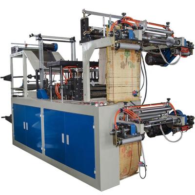 China Supermarket Fully Automatic Two Line Pe Or Nonwoven Material Plastic Apron Rolling Plastic Bag Cutting Machine Plastic Bag On Roll for sale