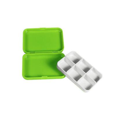 China Mini 4 Grid Travel Goods Weekly Eco-Friendly Colorful Portable Pill Box Plastic Jewelry Pearl Accessories Pill Organizer Pill Box for sale