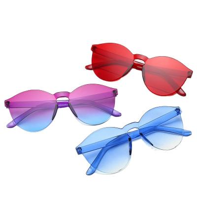 China Fashion sunglasses Europe and the United States new united rimless one-piece sunglasses candy color men's and women's sunglasses for sale