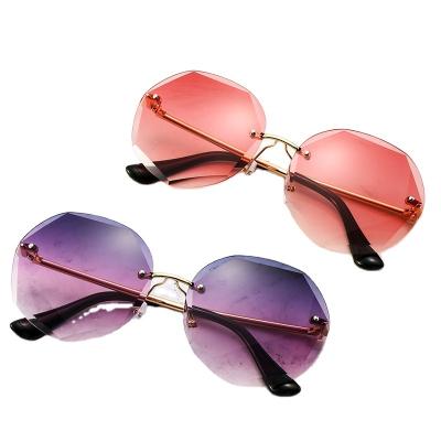 China Fashion Sunglasses 2022 Fashionable Thin Sunglasses New Big Frame Ocean Sunglasses Ladies Rimless Polygonal Face Big for sale