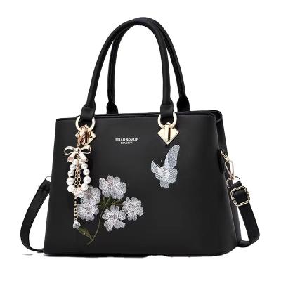 China 2022 Fashion Atmospheric Soft Handbag Embroidery Bag Shoulder Messenger Bag for sale