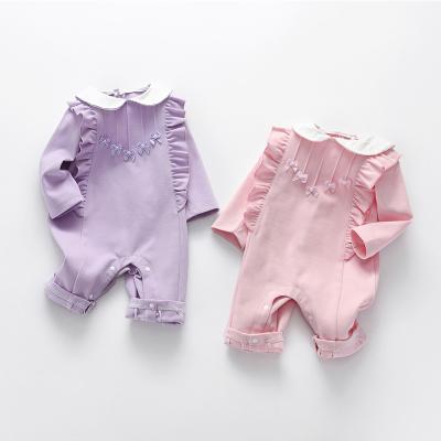 China Soft Fashionable Infant Baby Girl Rompers Simple Autumn Cotton Pleated Oneises Baby Rompers for sale