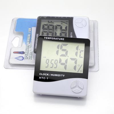 China Digital Thermometer Humidity Thermometer Hygrometer Weather Station Thermo Clock Htc-1 Room Temperature Meter for sale