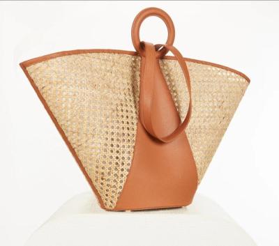 China 2022 Fashion Summer Hollow Out Design Rattan Straw Tote Bag Deluxe Lady Beach Basket Imitation Bag for sale