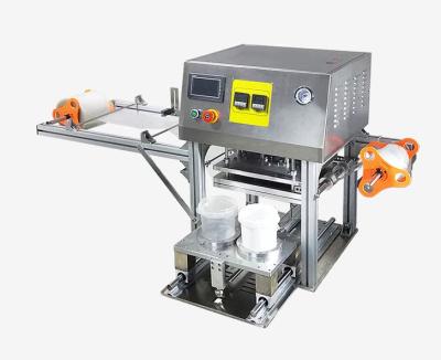 Chine Machine automatique de cachetage de seau de pot de 1600 Pcs/h pour la sauce de emballage à nourriture et les produits chimiques quotidiens à vendre