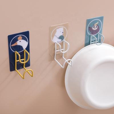 China 2021 Art Decor Brand New Cartoon Pattern Bathroom Metal Rack Wall Mounted Storage Rack Washbasin Organizer Hang No Drill Sink Rack for sale