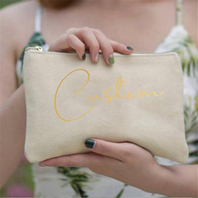 China Canvas Gold Printed Organic Cosmetic Bag Cotton Canvas Makeup Bag With Zipper for sale