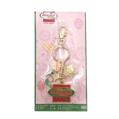 China Metal Color Cute Cartoon Dangle Girl Key Chain Key Chain Metal Enamel 4 Pieces Combination Key Chain for sale