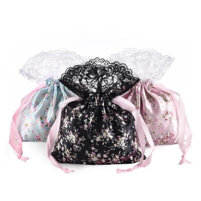 China Promotional Gift Custom Design Calico Satin Lace Top Jewelry Wig Hair Storage Organizer Drawstring Pouch Bag for sale