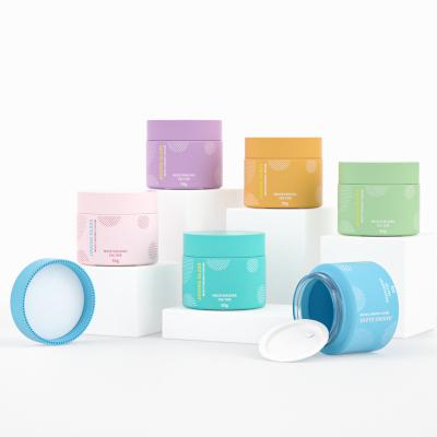 China Wholesale 15g 50g 30g Cosmetic Frosted Cream Jar Glass Cosmetic Jar With Colorful Cap for sale