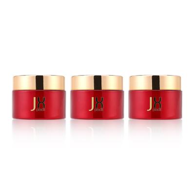 China Empty Frosted Red Cream Refillable Glass Jar Cosmetic Containers 30g Face Cream Containers for sale