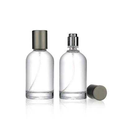 China Wholesale Custom Logo Luxury Cosmetic 35ml 50ml 100ml Refillable Round Spray Cosmetic Glass Perfume Bottle for sale